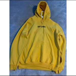 A yellow hooded sweatshirt